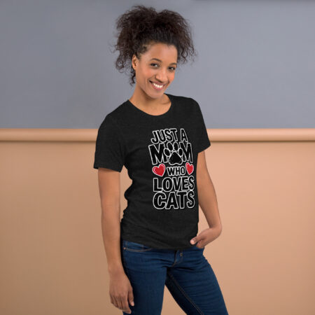 Black t-shirt with white text 'Just a Mom Who Loves Cats' and paw print graphic.
