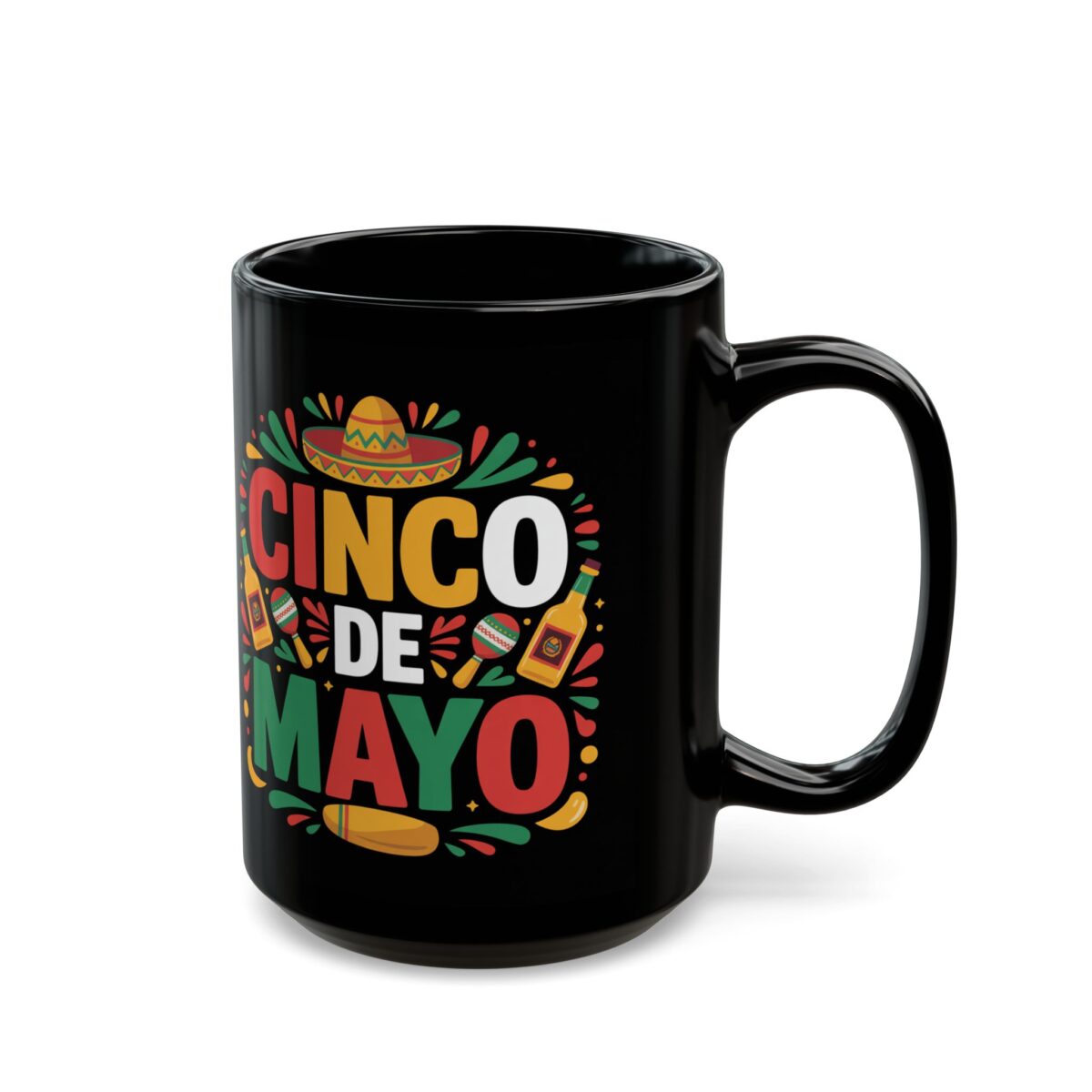 A black mug features a vibrant "Cinco De Mayo" design with a sombrero, maracas, chili peppers, and festive droplets in yellow, green, red, and white.