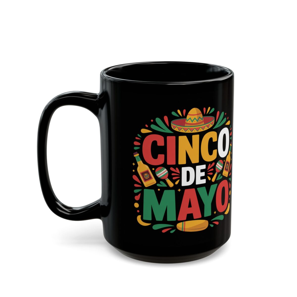 A black mug features a vibrant Cinco De Mayo design with a sombrero, maracas, and a bottle, set against colorful festive elements.