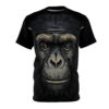 Realistic chimpanzee face with detailed fur and golden speckles covers this all over print t-shirt.