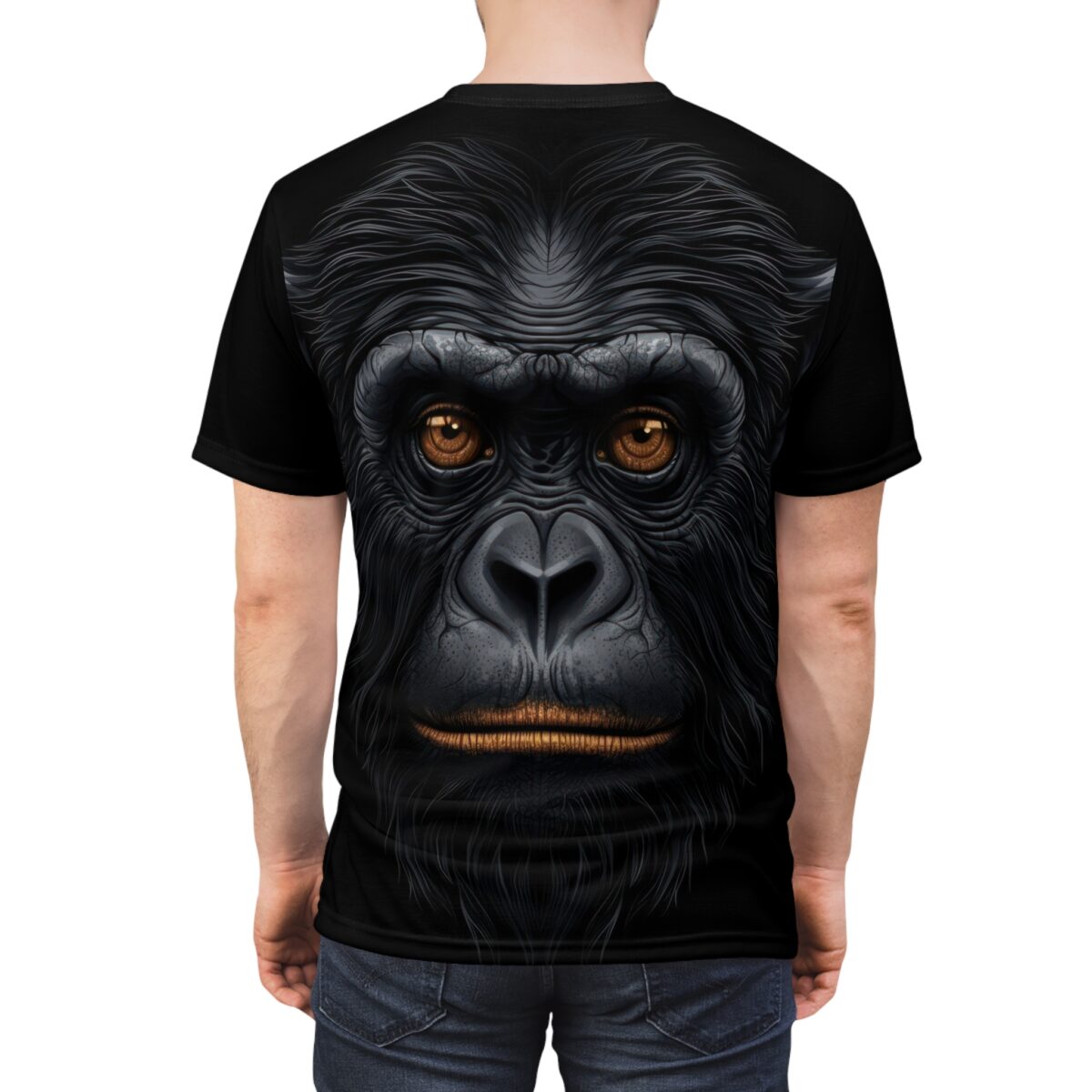 A hyper-realistic chimpanzee face with intense amber eyes fills this all over print t-shirt.