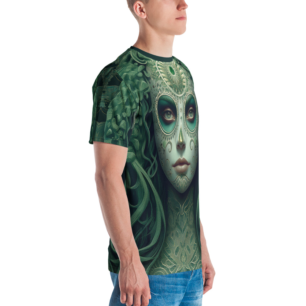 Lush green foliage and intricate patterns cover this patterned tee shirt, depicting a striking La Catrina figure with detailed facial markings and piercing eyes.
