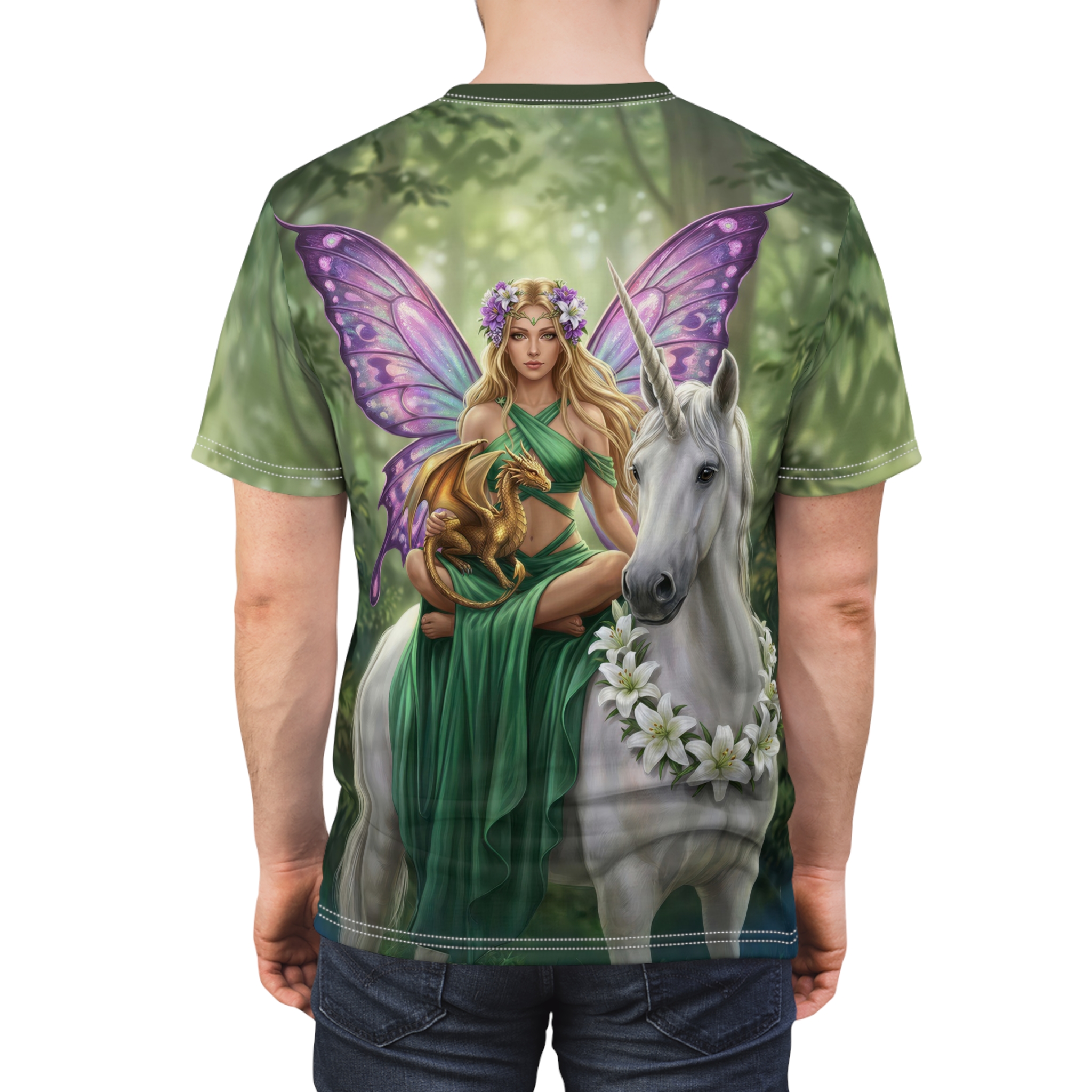 A blonde fairy with butterfly wings sits on a white unicorn, holding a gold dragon. All over print t-shirt.