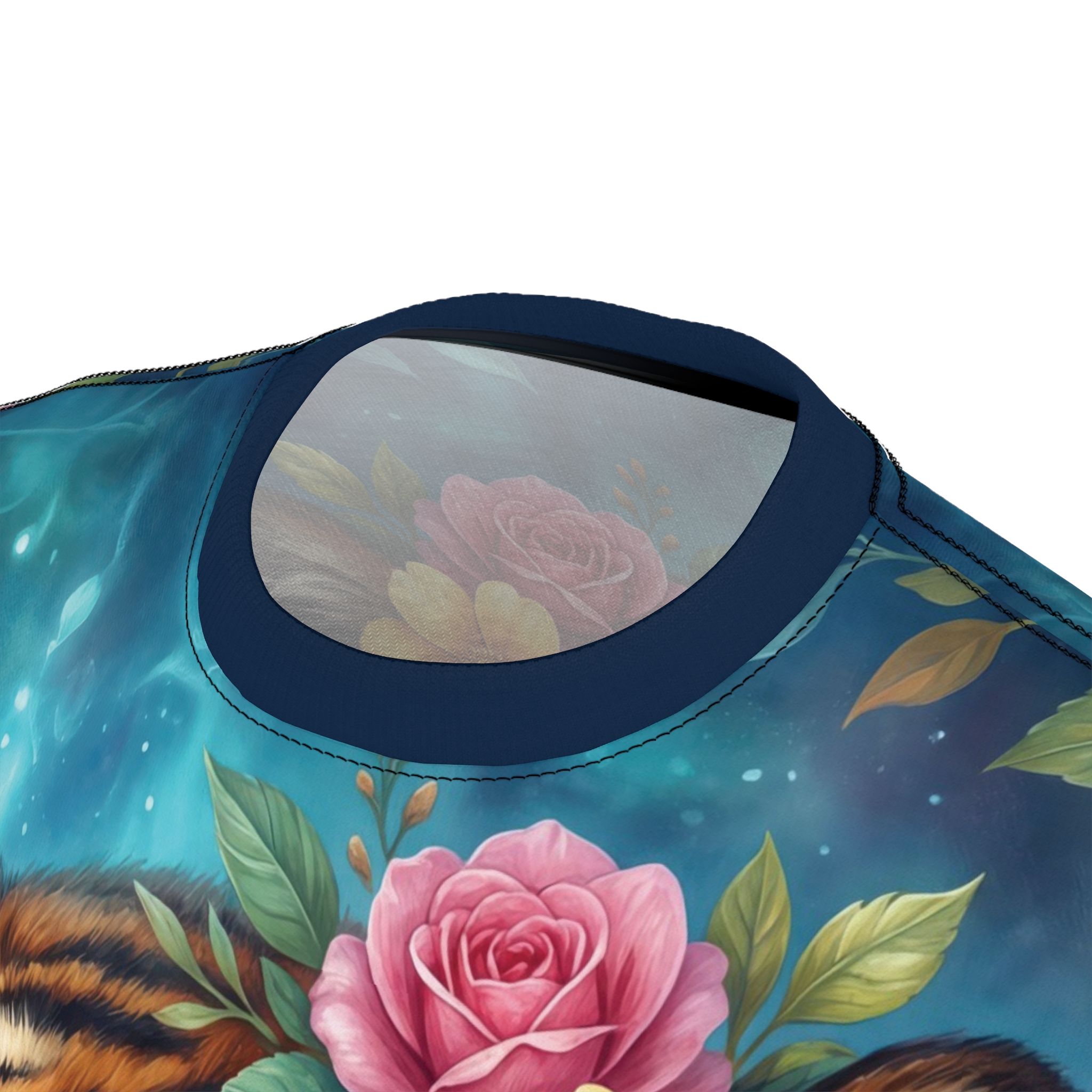 Pink roses and a tiger's fur pattern on a blue, cosmic background, forming an all over print t-shirt.