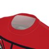 Red fabric shirt with black graphic elements and a textured panel visible inside the collar.