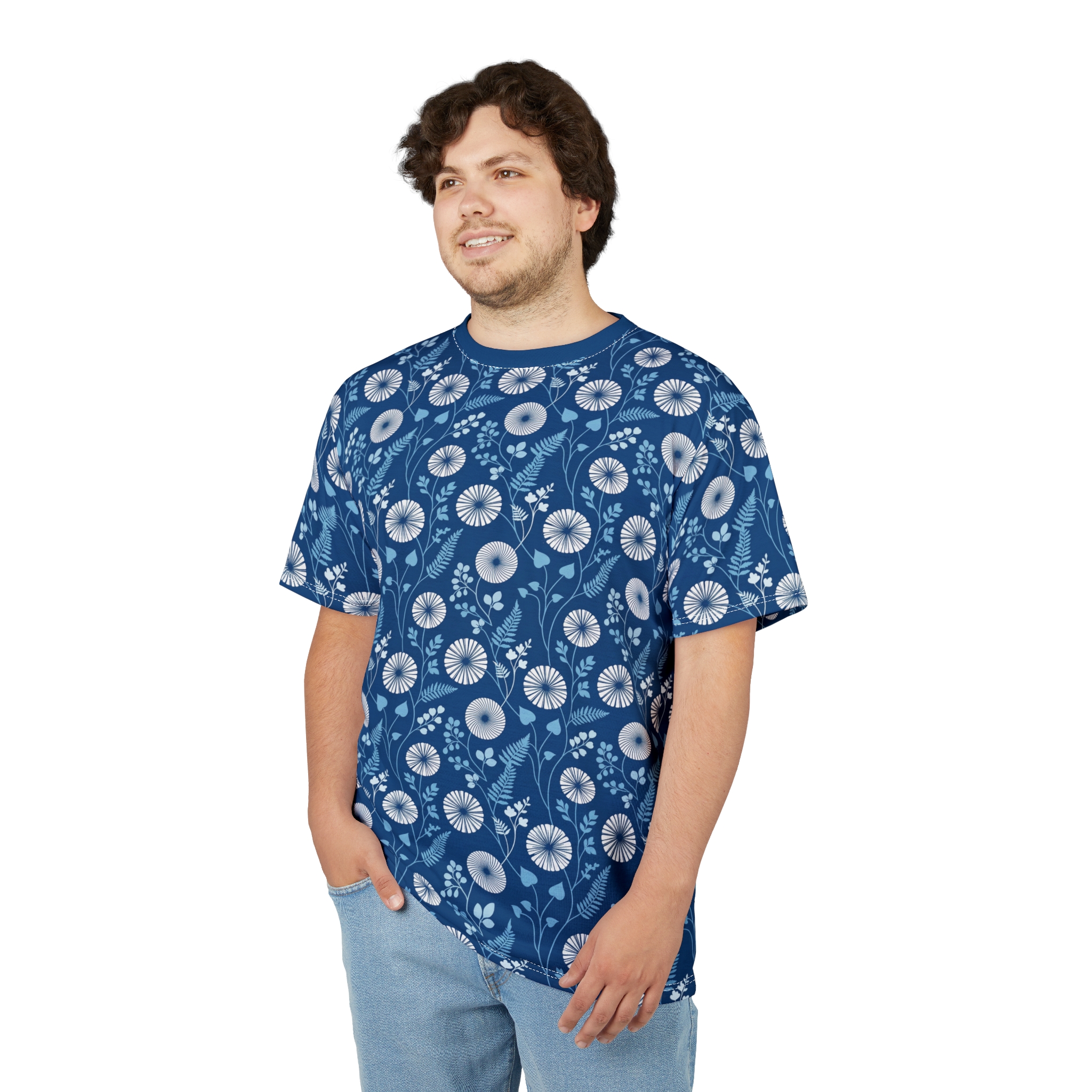 White and light blue botanical motifs on a deep blue seamless pattern tee.