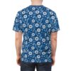Deep blue background with white and light blue floral and leaf patterns across this all over print t-shirt.