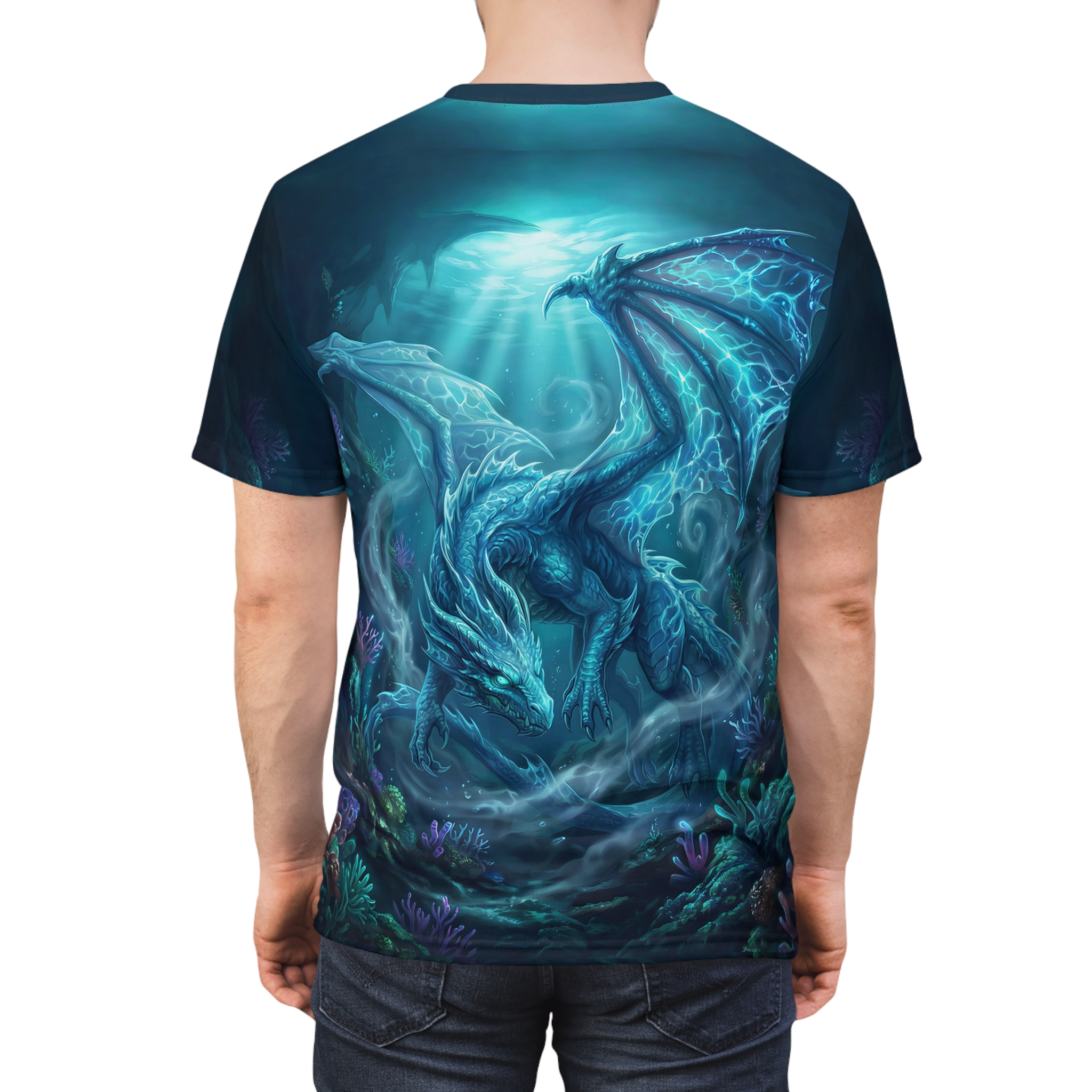 Blue dragon with glowing wings swims in a dark underwater cave, surrounded by coral. This is an all over print t-shirt.