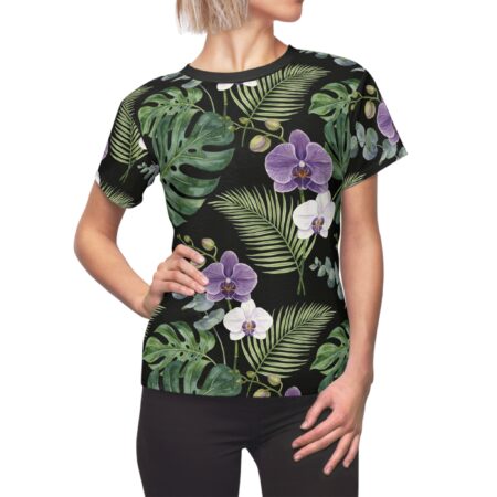 Black t-shirt with all over print of purple and white orchids, monstera leaves, and palm fronds.