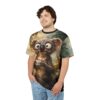 Whimsical cartoon koala with big eyes holding a cup of coffee, printed on an all over print t-shirt.