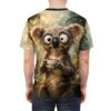 A fluffy koala with wide eyes sips hot tea, surrounded by a sun-dappled forest, on this all over print t-shirt.
