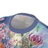 Pink cherry blossoms and vibrant purple lilies bloom across this all over print t-shirt against a soft blue sky.