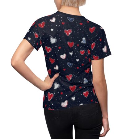 Navy all over print sublimation tee showcasing a scattered pattern of red, white, and blue sketched hearts with white speckles.