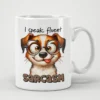A white ceramic mug with a funny cartoon dog wearing glasses and sticking out its tongue.