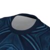 Frost-covered armor plates wrap around this garment in a vivid all-over print that spans every inch of the fabric from the collar to the hem.