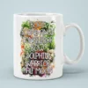 White ceramic mug with colorful floral design and bold text listing 