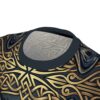 Ornate gold Norse wolf face markings weave across every inch of this garment in a high-definition all-over print that spans from the neck to the hem.