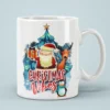 White ceramic mug with festive Christmas graphic featuring Santa, reindeer, penguin, and tree.