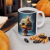 Glossy white ceramic mug features a vibrant, full-wrap print of a fluffy yellow duckling with large eyes standing in the rain against a deep blue background.