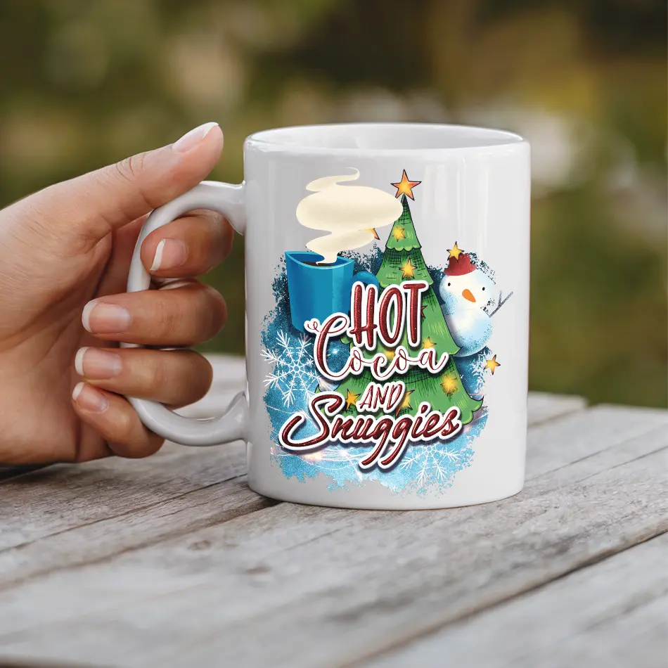 White ceramic mug with a festive holiday design featuring a Christmas tree, snowman, hot cocoa, and snowflakes.