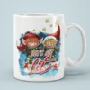 White ceramic mug with a festive design featuring two cartoon elves, stars, and the phrase 
