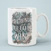 White ceramic mug with a distressed blue and white floral background and bold text that says 