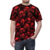 Red skulls with headphones are printed all over this black t-shirt, featuring a gothic aesthetic.