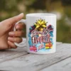 White ceramic mug with 'Santa's Favorite Girl' text and festive holiday graphics.