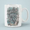 White ceramic mug with the text 