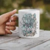 White ceramic coffee mug with the phrase 