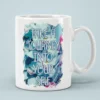 White ceramic mug with text 