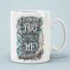 White ceramic mug with a graphic featuring the text 