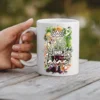 White ceramic mug with a floral design and text 