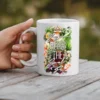 White ceramic mug with vibrant floral design and 