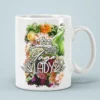 White ceramic mug with a vibrant floral design and 