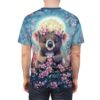 Pink cherry blossoms and a full moon cover this all over print apparel, featuring a kawaii koala in a floral wreath sitting amongst flowers.