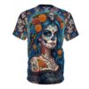 Vibrant blue fabric features a detailed calavera floral print in a comfortable, relaxed fit with smooth textures that showcase rich orange and gold accents.