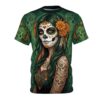 Green background with gothic floral skulls and a woman with sugar skull face paint and tattoos. This is an all over print t-shirt.