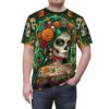 Vibrant marigold and skull motifs cover this 360-degree graphic tee, showcasing emerald green tones and intricate floral details on soft fabric.