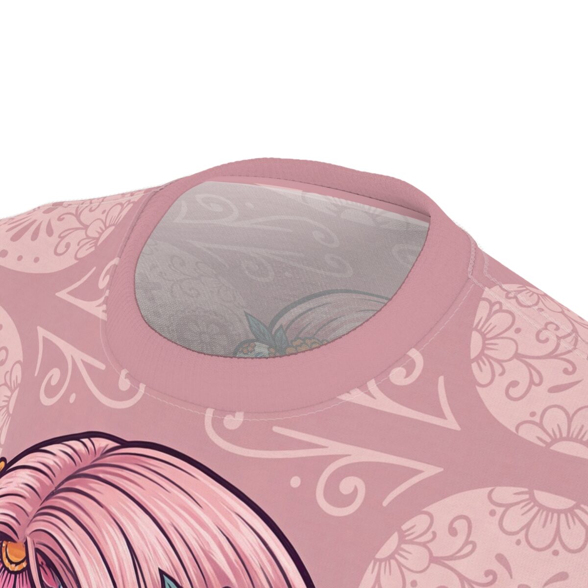 Soft pink all over print t-shirt with delicate floral and swirl patterns, and a sugar skull design.