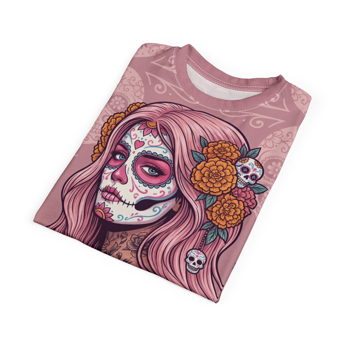 Pink calavera with floral accents and skull charms adorn this all over print t-shirt.
