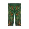 Green sugar skulls with orange floral accents and intricate swirling patterns cover this all over print apparel, depicting a vibrant Day of the Dead theme.