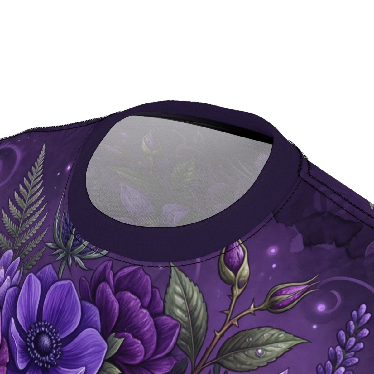 Vibrant purple skulls and floral motifs saturate this gothic t-shirt through a seamless pattern that covers every inch of the fabric from collar to hem.