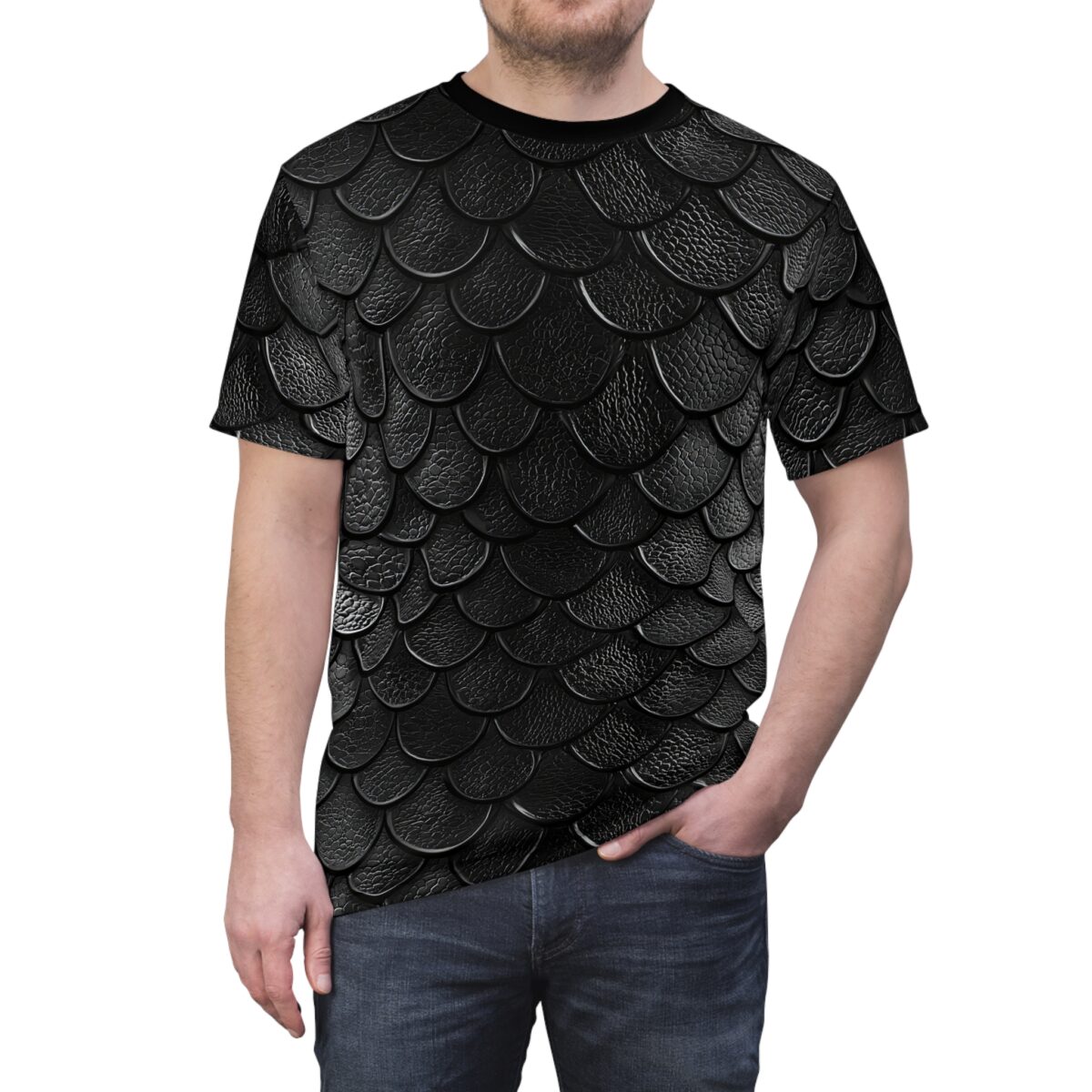 Man wearing a black t-shirt featuring a textured 3D dragon scale pattern against a white background.