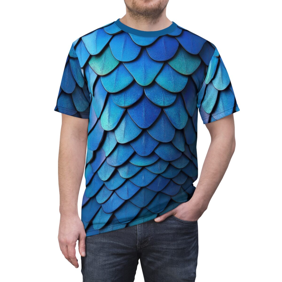 Man wearing a blue t-shirt with a realistic dragon scale print pattern against a white background.