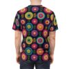 All over print t-shirt with vibrant, crochet-style circular floral patterns and green leaf accents on a dark background.