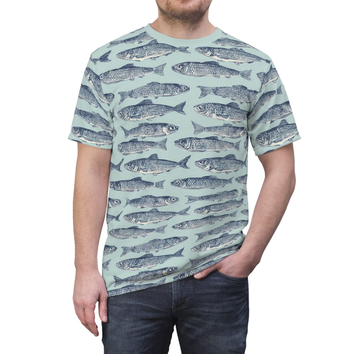All over print sublimation tee featuring a seamless pattern of blue fish on a light blue background.