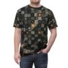 Man wearing a short-sleeve t-shirt with a detailed geometric and circuitry pattern in dark tones with glowing orange accents.