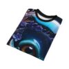 T-shirt front fold, detailed close-up of an aquatic creature's eye, purple flowers, coral, water bubbles, blue gradient background, black neckline.