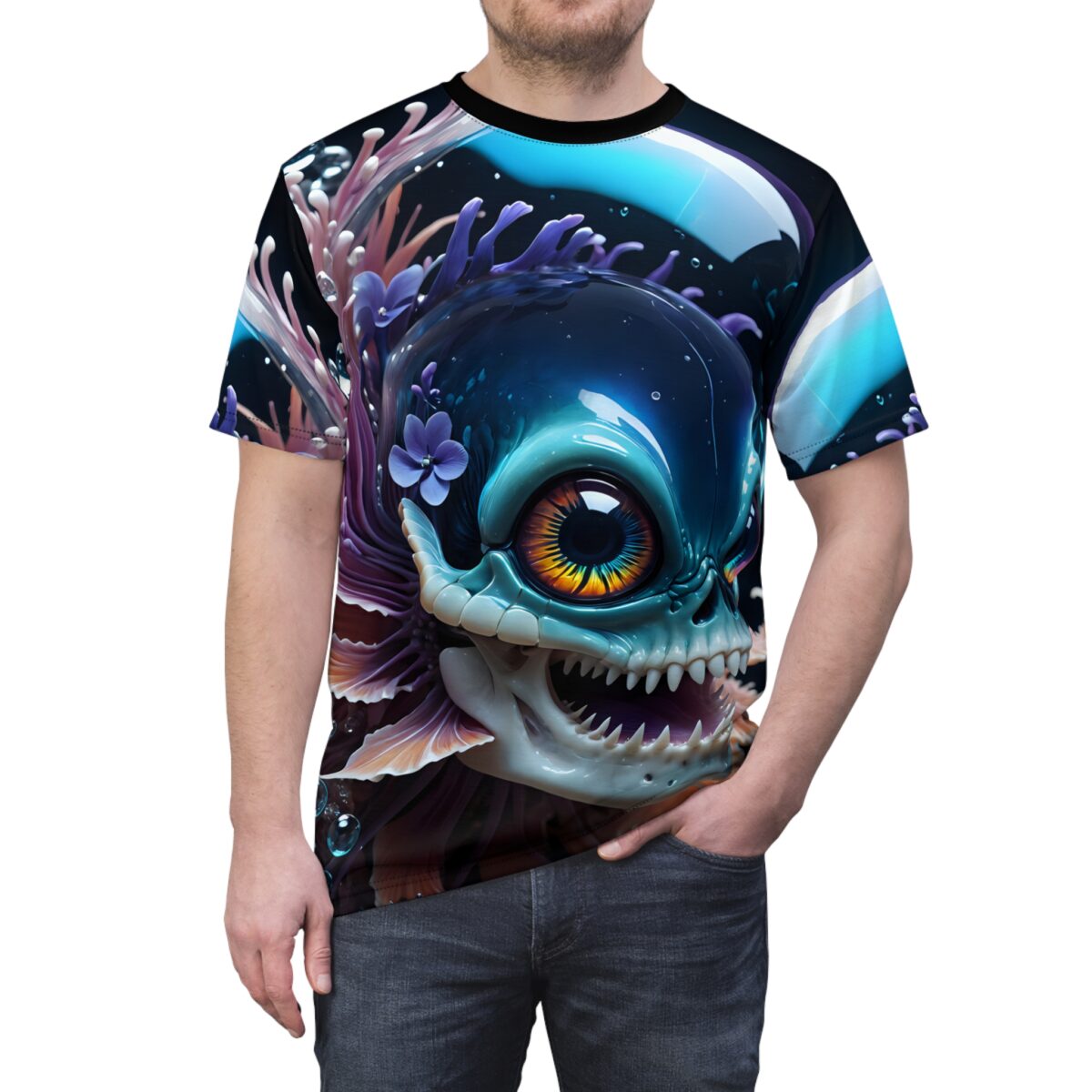 T-shirt with all-over print of a blue monster fish head with large orange and yellow eye, sharp teeth, purple fins, and coral details.
